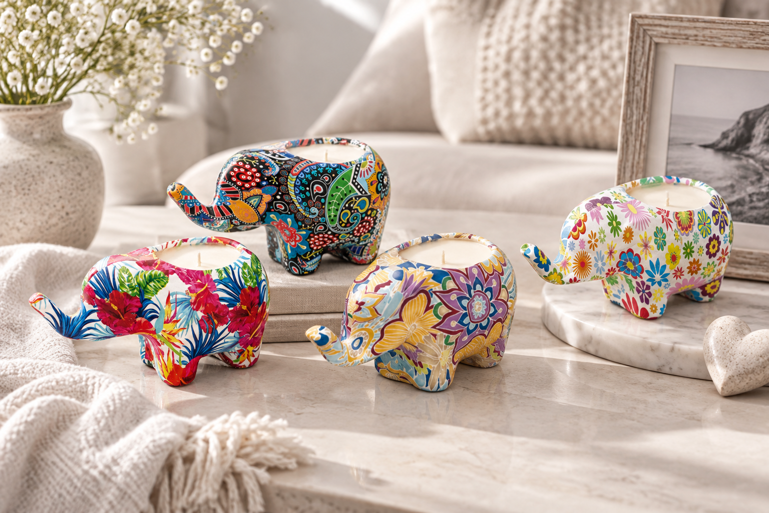 A display of four ceramic candles in various shapes and designs sits on a wooden surface with a "Shop Now" button and the text "Ceramic Candles" in the background.